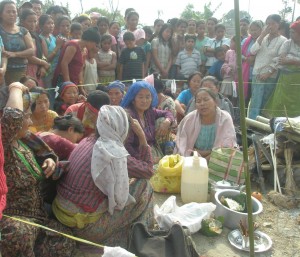 Subba's relatives with the grief-striken family during funeral in the Ratuwa River