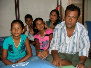 Sita (left) and her family at the IOM transit centre in Kathmandu. Sita is the 20,000th Bhutanese to be resettled in America.