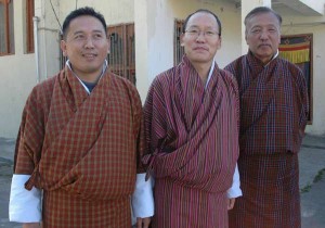 Meghraj Gurung (right), a council member of Center for Bhutan Studes (CBS) obeys order for wearing local dress 