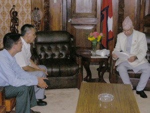 Nepalese PM reads the appeal of DNC. Dorji (middle) and Nepalese journalist Binod Dhungel in the DNC delegation/Vidhyapati